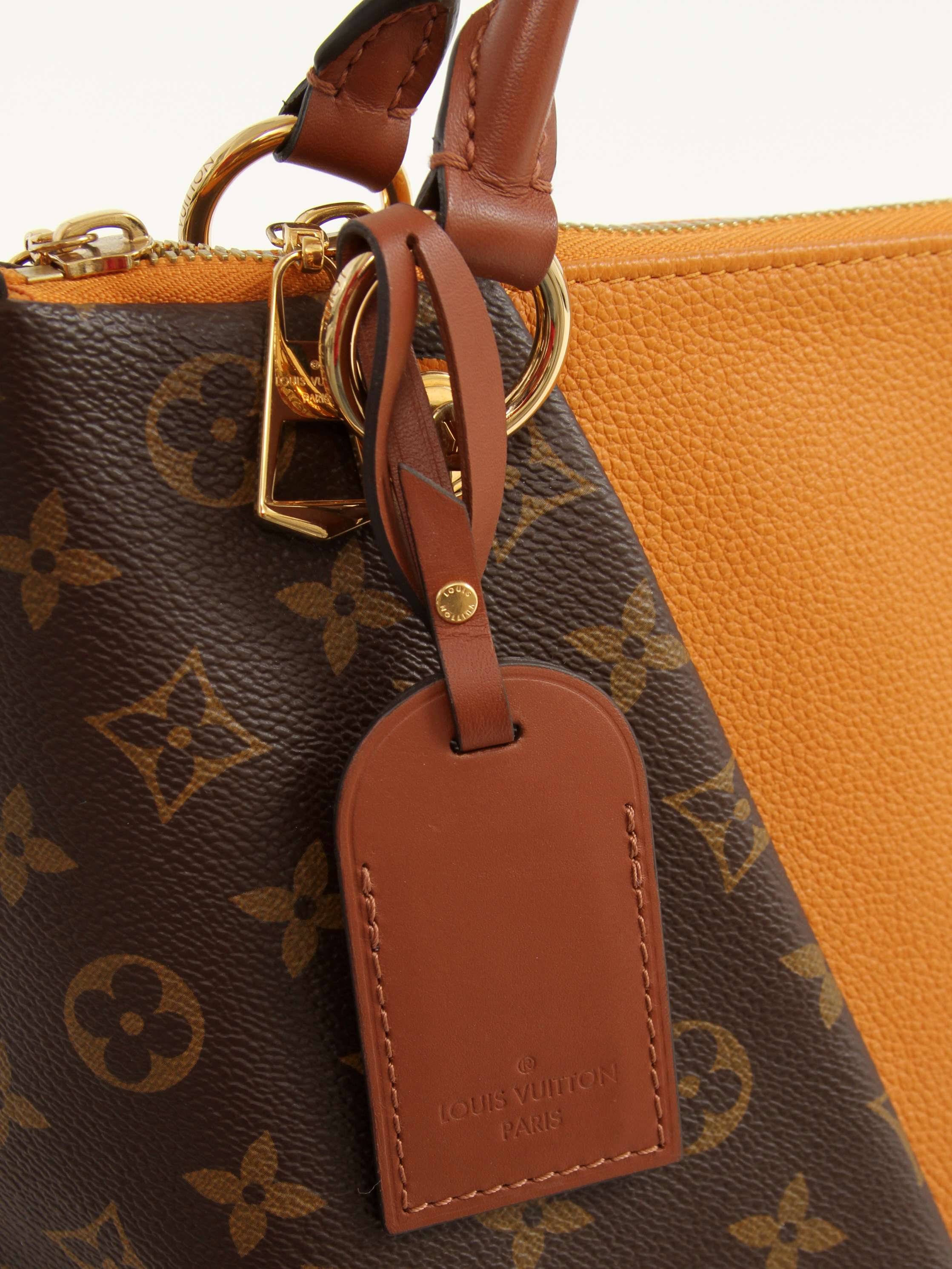 Louis Vuitton V Tote 5